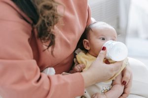 Chauffe-biberon Momcozy 2026 : Guide complet & comparatif